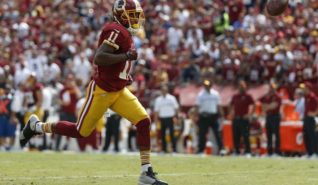 Washington Redskins wide receiver DeSean Jackson (11) chases an overthrown ball during the first half of an NFL football game against the Dallas Cowboys in Landover, Md., Sunday, Sept. 18, 2016. (AP Photo/Alex Brandon)