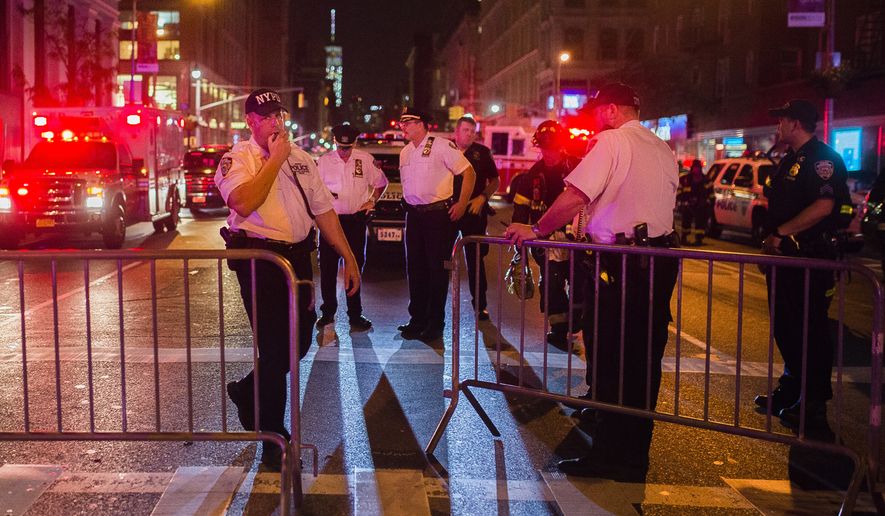 Police work near the scene of an explosion in Manhattan&#x27;s Chelsea neighborhood, in New York, Saturday, Sept. 17, 2016. An explosion in a crowded Manhattan neighborhood on Saturday night left more than two dozen people injured, and authorities said a second nearby site was also being investigated. Mayor Bill de Blasio called the blast an &quot;intentional act,&quot; but said there was no terrorist connection.  (AP Photo/Andres Kudacki)