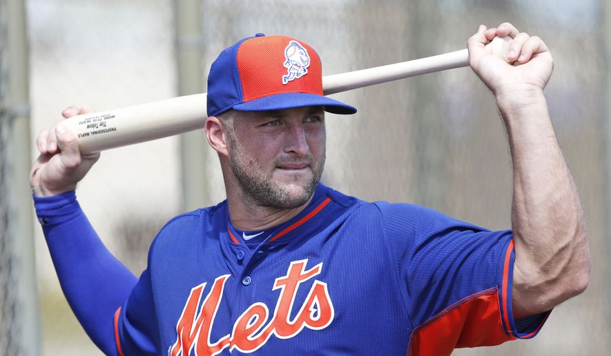 Tim Tebow stretches out before batting practice at the New York Mets' complex, Monday, Sept. 19, 2016, in Port St. Lucie, Fla. The 2007 Heisman Trophy winner and former NFL quarterback got to the complex early Monday, and started his first workout as part of their instructional league team. (AP Photo/Wilfredo Lee) **FILE**