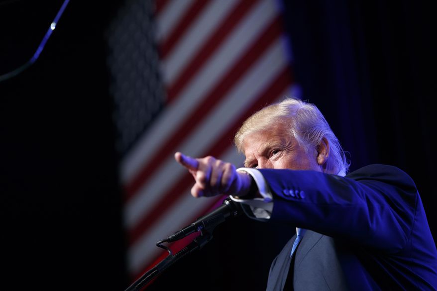 In this Sept. 16, 2016, photo, Republican presidential candidate Donald Trump speaks during a campaign rally at the James L. Knight Center in Miami. Republicans are still counting on strong support from the Cuban-American community in south Florida as they try to win back the White House. But the GOP-Cuban alliance is softening, and Trump could speed the process. (AP Photo/ Evan Vucci)