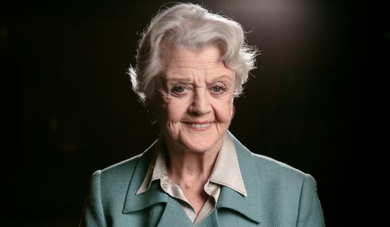 In this Dec. 5, 2014 file photo, Angela Lansbury poses for a portrait at the Ahmanson Theatre in Los Angeles. (Photo by Casey Curry/Invision/AP, File)