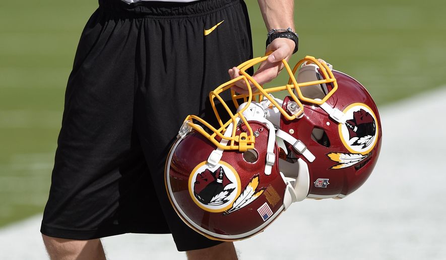 In this Aug. 19, 2016, file photo, Washington Redskins football helmets are seen before an NFL preseason football game between the Washington Redskins and the New York Jets, in Landover, Md. The Supreme Court could decide as early as this month whether to hear the dispute involving the Portland, Oregon-area band. And if the Washington Redskins football team has its way, the justices could hear both cases in its new term. (AP Photo/Nick Wass) ** FILE **