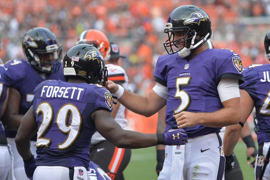 Quarterback Joe Flacco (5) and the Baltimore Ravens are 2-0 despite struggling offensively in their two victories. (Associated PRess)