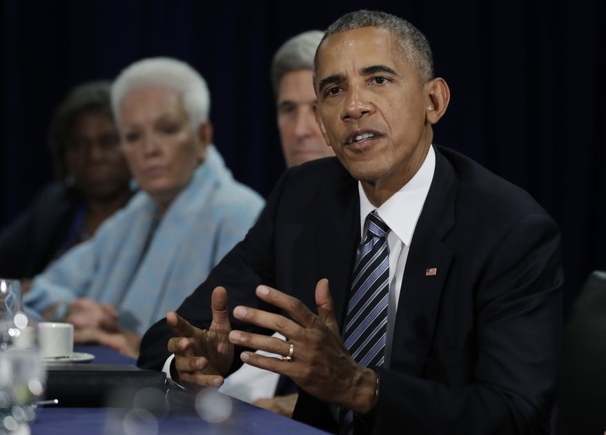 President Barack Obama, joined by Secretary of State John Kerry, second from right, speaks to media during a bilateral meeting with Nigerian President Muhammadu Buhari on the margins of 71st session of the United Nations General Assembly, Tuesday, Sept. 20, 2016. (AP Photo/Carolyn Kaster)