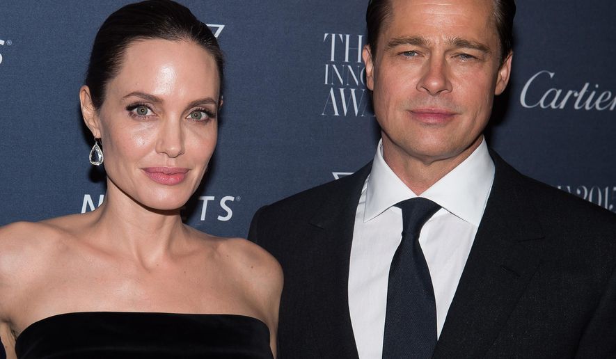 FILE - In this Nov. 4, 2015 file photo Angelina Jolie Pitt and Brad Pitt attend the WSJ Magazine Innovator Awards 2015 at The Museum of Modern Art in New York. Jolie has filed for divorce from Pitt, bringing an end to one of the world’s most star-studded, tabloid-generating romances. (Photo by Charles Sykes/Invision/AP, File)