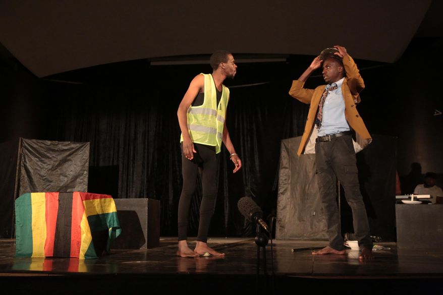 Zimbabwean actors are seen during a comedy scene from a show called State of The Nation, Wednesday, Sept,14, 2016. Zimbabwe's comedy scene is booming as the country's economy is tanking, and police are cracking down on growing anti government protests. At the recent State of the Nation show, even 92 year President Robert Mugabe widely accused of muzzling free speech was a target.Insulting the president can attract a sentence of a year in jail in the Southern African nation. (AP Photo/Tsvangirayi Mukwazhi)