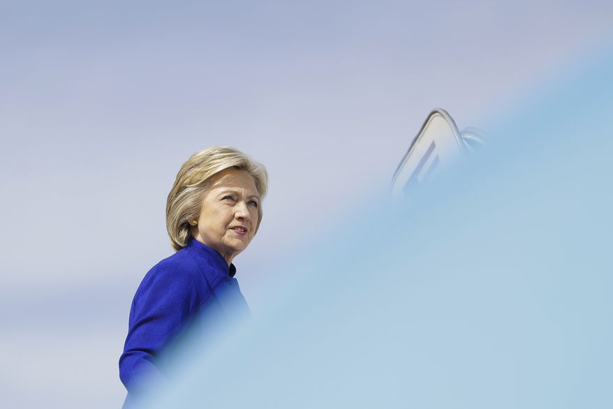 Democratic presidential candidate Hillary Clinton boards her campaign plane at Westchester County Airport, in White Plains, N.Y., Wednesday, Sept. 21, 2016. (AP Photo/Matt Rourke)