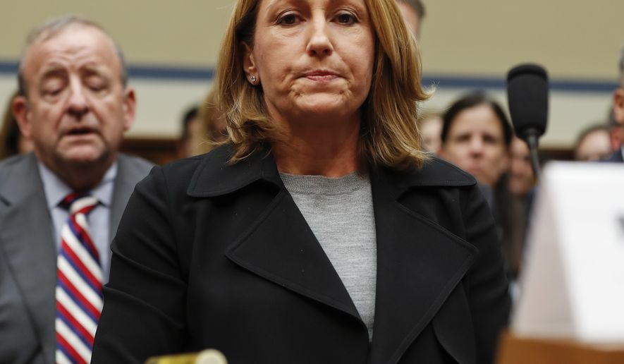Mylan CEO Heather Bresch pauses as she prepares to testify on Capitol Hill in Washington, Wednesday, Sept. 21, 2016, before the House Oversight Committee hearing on EpiPen price increases. Bresch defended the cost for life-saving EpiPens, signaling the company has no plans to lower prices despite a public outcry and questions from skeptical lawmakers. (AP Photo/Pablo Martinez Monsivais)