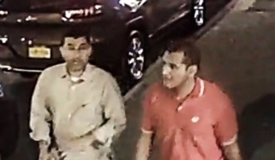 The image released by the FBI shows two men walking along West 27th Street between 6th Avenue and 7th Avenue between 8 and 9 p.m. Saturday. (Source: FBI)