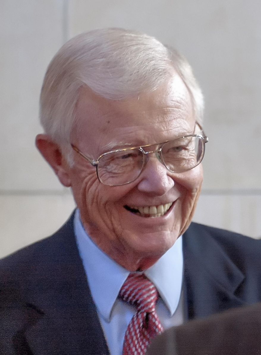 In this March 31, 2004, photo, former third district Rep. Bill Barrett, R-Neb., smiles in Lincoln, Neb., during the annual return of former senators to the state Capitol. Barrett, a conservative Republican who helped shape farm policy in the 1990s, died Tuesday, Sept. 20, 2016, in his hometown of Lexington, Neb. He was 87. Barrett represented western Nebraska for a decade in Congress and was known for his willingness to compromise. (AP Photo/Nati Harnik)