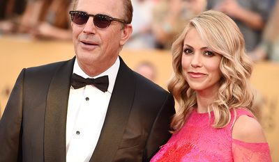 Kevin Costner was born 22 years before his wife Christine Baumgartner (AP Photo)
