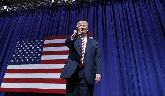Republican presidential candidate Donald Trump arrives for a campaign rally at Sun Center Studios, Thursday, Sept. 22, 2016, in Aston, Penn. (AP Photo/ Evan Vucci)