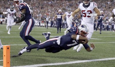 New England Patriots quarterback Jacoby Brissett (7) dives into the end zone for a touchdown past Houston Texans linebacker Max Bullough (53) during the first half of an NFL football game Thursday, Sept. 22, 2016, in Foxborough, Mass. (AP Photo/Charles Krupa)