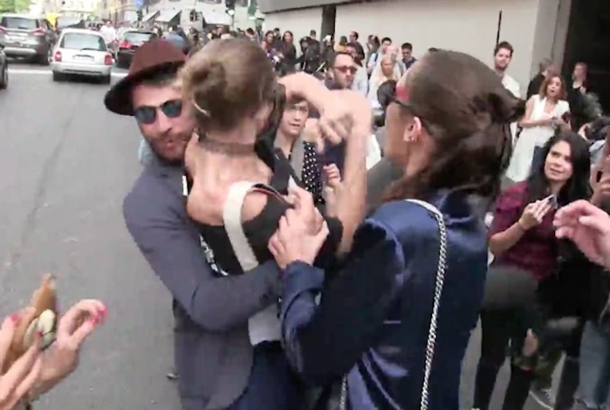 Gigi Hadid was captured on video fighting off infamous prankster Vitalii Sediuk, who tried to pick her up outside the Max Mara fashion show in Milan on Thursday. (TMZ)