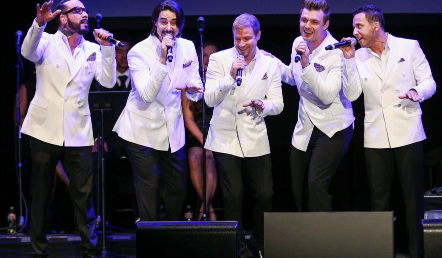 FILE - In this May 19, 2016 file photo, A.J. McLean, from left, Kevin Richardson, Brian Littrell, Nick Carter and Howie Dorough of the Backstreet Boys perform at the 12th Annual MusiCares MAP Fund Benefit Concert held at The Novo by Microsoft, in Los Angeles. Backstreet will be back - and back and back and back _ in Las Vegas. The pop group Backstreet Boys confirmed reports Friday, Sept. 23, 2016, they will begin a Planet Hollywood residency next year. (Photo by John Salangsang/Invision/AP, File)