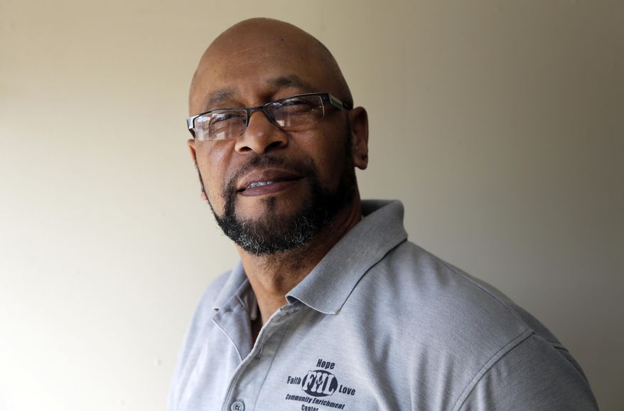 In this Sept. 15, 2016, photo, the Rev. Moses Colbert poses for a photo at his church in Gastonia, N.C. As Americans prepare to cast ballots for the next president, the voting process has never been more convoluted. A federal appeals court over the summer struck down several parts of a North Carolina law that not only required voters to show photo ID but also reduced early voting and eliminated same-day registration during the early voting period. Colbert, a black pastor from Kings Mountain, N.C., was among those who challenged the law after finding himself unable to vote in 2014. (AP Photo/Chuck Burton)