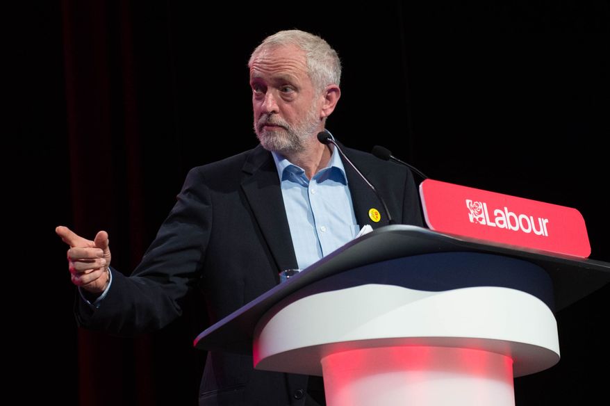 Newly re-elected opposition Labour Party leader Jeremy Corbyn speaks during the Labour women's conference in Liverpool a day ahead of the Party's annual conference, Saturday Sept. 24, 2016. (Stefan Rousseau/PA via AP)
