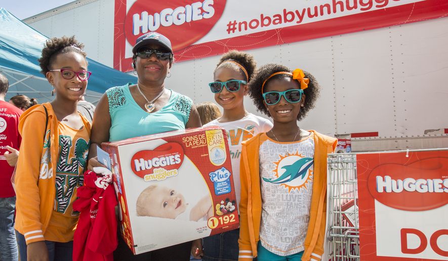 IMAGE DISTRIBUTED FOR HUGGIES - Fans came to the Dolphins home-opener to support Huggies and No Baby Unhugged with donated diapers for local South Florida kids in need on Sunday, Sept. 25, 2016 in Miami Gardens, Fla. (Jesus Aranguren/AP Images for Huggies)