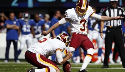 Washington Redskins kicker Dustin Hopkins (3) boots a field goal during the first half of an NFL football game against the New York Giants, Sunday, Sept. 25, 2016, in East Rutherford, N.J. (AP Photo/Kathy Willens) **FILE**
