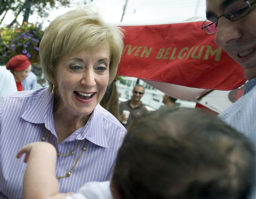 In this Aug. 15, 2012, file photo, Linda McMahon, Republican candidate for U.S. Senate, left, talks with supporter David Becker and his baby daughter Shelby at campaign stop in Fairfield, Conn. The former wrestling executive and two-time Senate candidate has been involved in Republican campaigns across the country in 2016, including hosting fundraisers and making political contributions for major candidates. (AP Photo/Jessica Hill, File)