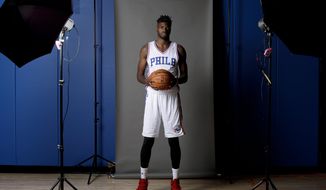 Philadelphia 76ers center Nerlens Noel poses for a photograph during media day at the NBA basketball team&#x27;s practice facility, Monday, Sept. 26, 2016, in Camden, N.J. Shortly after 76ers president and general manager Bryan Colangelo said he is not actively shopping any of his players, Noel openly wondered how he, Jahlil Okafor and Joel Embiid can co-exist as the team’s three big men. “I don’t see a way of it working,” Noel said Monday, one day before the Sixers’ first full workout in their new practice facility along the New Jersey riverfront across from Philadelphia. “It’s just a logjam.&amp;quot; (AP Photo/Matt Slocum)