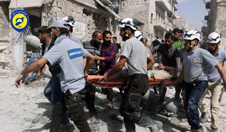 In this Wednesday, Sept. 21, 2016, file photo, provided by the Syrian Civil Defense White Helmets, rescue workers work the site of airstrikes in the al-Sakhour neighborhood of the rebel-held part of eastern Aleppo, Syria. Syrian Foreign Minister Walid al-Moallem said in a TV interview broadcast Monday, Sept. 26, 2016, that an internationally-brokered cease-fire for Syria is still viable, as rescue workers in Aleppo cleaned up from what they said were the worst airstrikes on rebel-held areas of the northern city in five years. Syria&#39;s military declared the cease-fire ended one week ago. (Syrian Civil Defense White Helmets via AP, File)