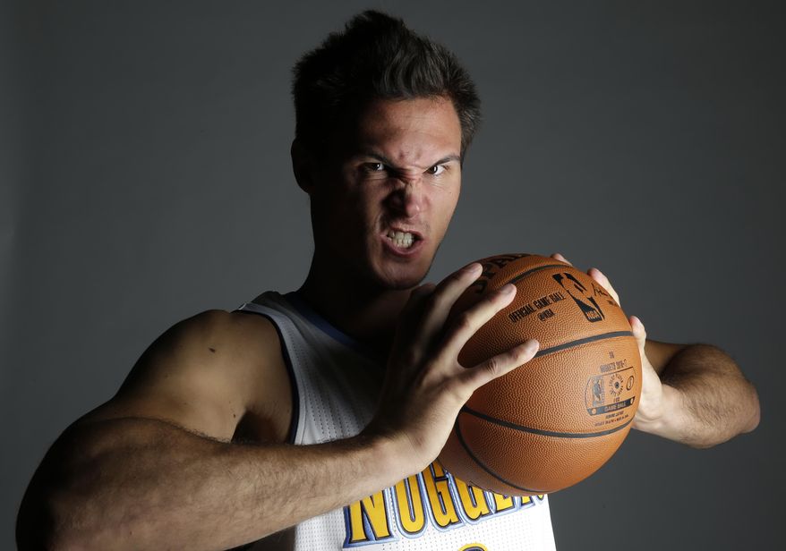 Denver Nuggets' Danilo Gallinari, from Italy, poses for a photo during NBA basketball media day, Monday, Sept. 26, 2016, in Denver. (AP Photo/Jack Dempsey)