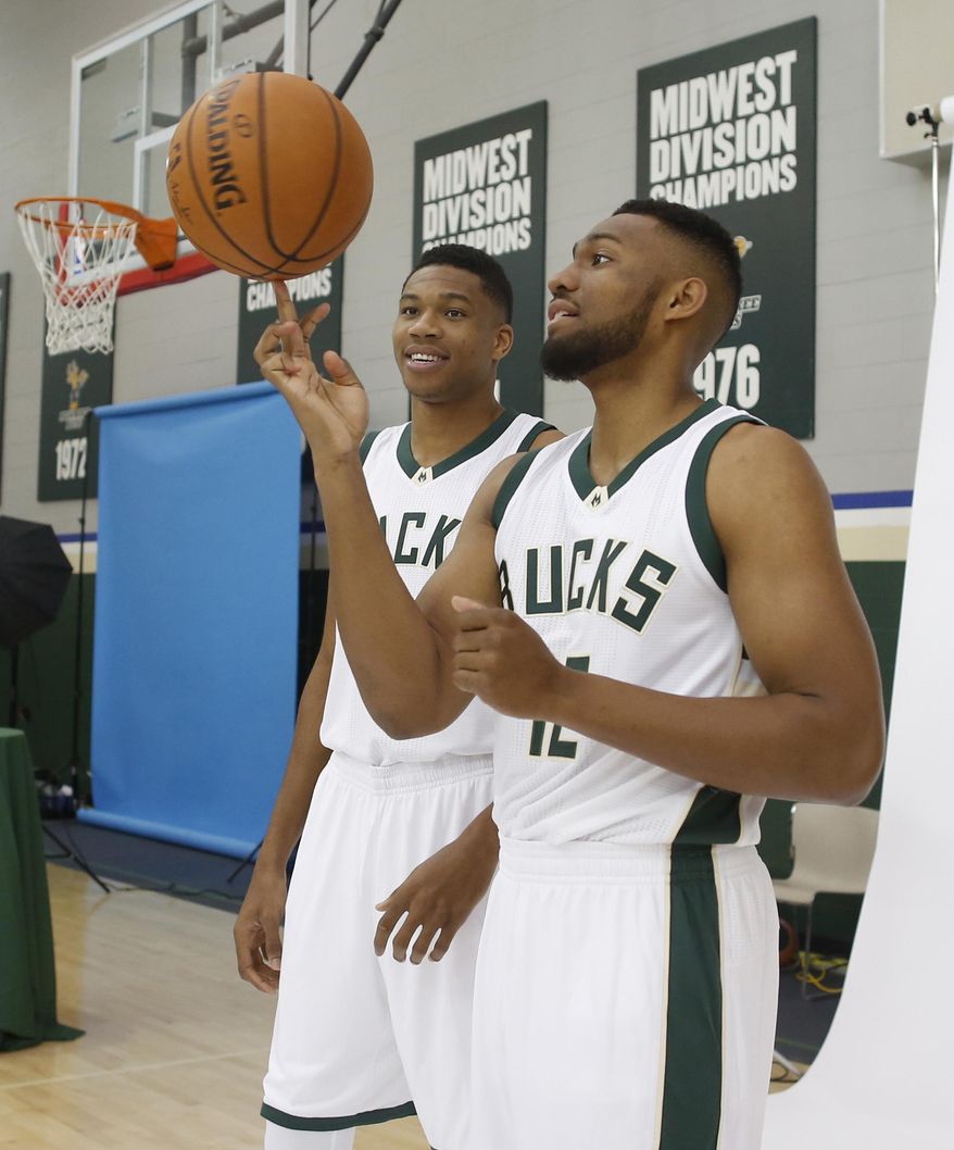 Milwaukee Bucks' Giannis Antetokounmpo, left, and Jabari Parker pose during the team's NBA basketball media day Monday, Sept. 26, 2016, in Milwaukee. (AP Photo/Jeffrey Phelps)