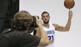 Charlotte Hornets&#39; Marco Belinelli poses for a photo during the NBA basketball team&#39;s media day in Charlotte, N.C., Monday, Sept. 26, 2016. (AP Photo/Chuck Burton)
