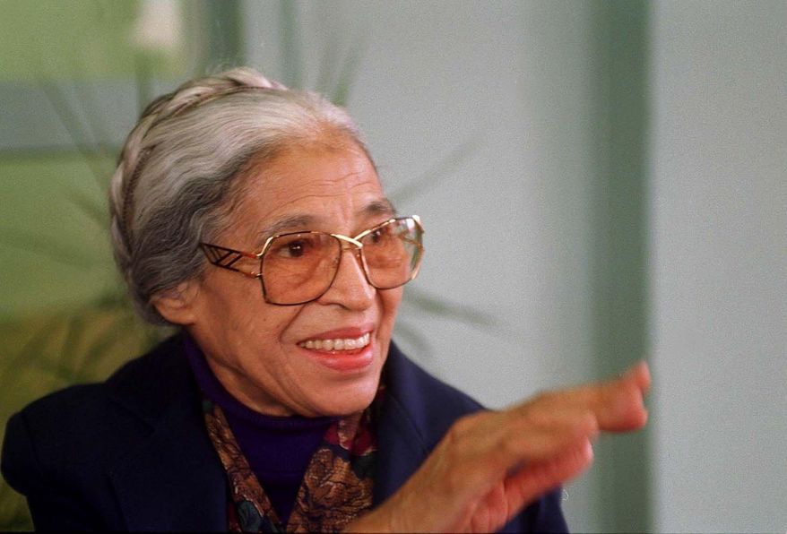 This May 9, 1995 photo shows Rosa Parks at a news conference in Detroit. A former Detroit home belonging to Parks is set to be torn down and refashioned for a new purpose. The Detroit Free Press reports that what’s left of the home in the southwest part of the city will be torn down Monday, Sept. 26, 2016. The property will be turned into an urban garden that is planned to supply the neighborhood with vegetables. The home’s facade has been removed and will be refashioned into a replica-style artwork that’ll be shown in museums across Europe. (Hugh Grannum/Detroit Free Press via AP)