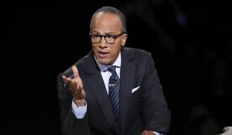 Moderator Lester Holt, anchor of NBC Nightly News, asks a question of Democratic presidential nominee Hillary Clinton during the presidential debate Republican presidential nominee Donald Trump at Hofstra University in Hempstead, N.Y., Monday, Sept. 26, 2016. (Joe Raedle/Pool via AP)