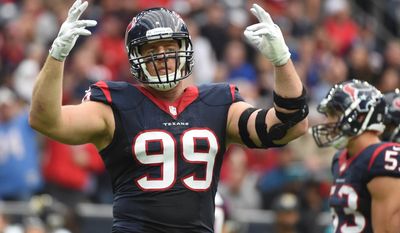 FILE - In this Jan. 3, 2016, file photo, Houston Texans defensive end J.J. Watt (99) gestures during the first half of an NFL football game against the Jacksonville Jaguars, in Houston. A person familiar with J.J. Watt’s condition says he has re-injured his back and the Houston Texans expect him to be out until at least December, and possibly the entire season, Tuesday, Sept. 27, 2016. (AP Photo/Eric Christian Smith, File)