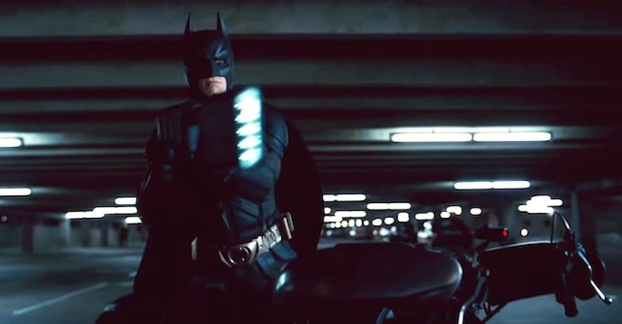 Christian Bale's Batman suit from “The Dark Knight” and “The Dark Knight Rises” sold for $250,000 at an auction by the U.K.-based Prop Store. (Facebook, Warner Bros. Pictures)
