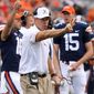 FILE - In this Sept. 3, 2016, file photo, Virginia head coach Bronco Mendenhall calls for a two-point conversion during the second half of an NCAA college football game in Charlottesville, Va. (AP Photo/Andrew Shurtleff, File) **FILE**