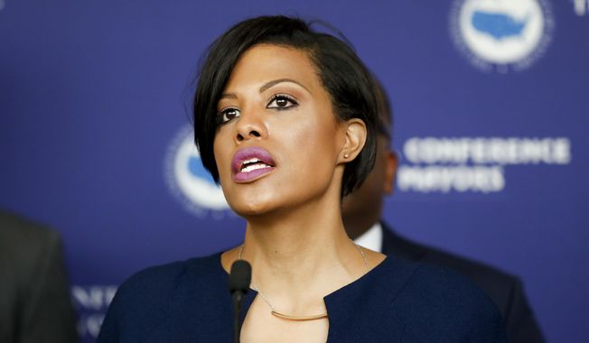 FILE - In a Tuesday, July 26, 2016 file photo, Baltimore Mayor Stephanie Rawlings-Blake speaks during the U.S. Conference of Mayors meeting in Philadelphia, during the second day of the Democratic National Convention. Rawlings-Blake told reporters Wednesday, Sept. 28, 2016, that State&#x27;s Attorney Marilyn Mosby rushed to prosecute six police officers in the death of Freddie Gray, a young black man whose neck was broken in the back of a transport wagon. The mayor&#x27;s comments were in response to a profile of Mosby in The New York Times Magazine in which she said the mayor disseminated false information about the investigation into Gray&#x27;s death.  (AP Photo/Alex Brandon, File)