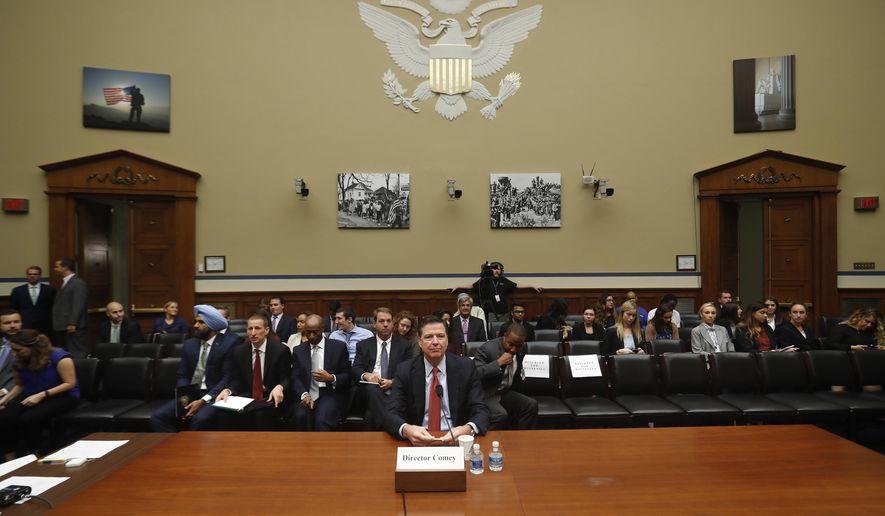 FBI Director James Comey prepares to testify on Capitol Hill in Washington, Wednesday, Sept. 28, 2016, before the House Judiciary Committee hearing on 'Oversight of the Federal Bureau of Investigation.' (AP Photo/Pablo Martinez Monsivais)