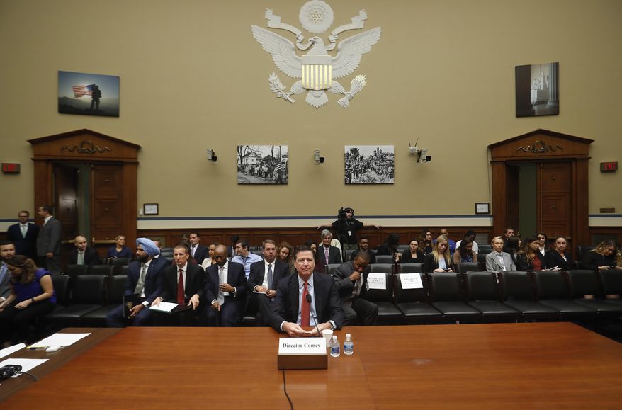 FBI Director James Comey prepares to testify on Capitol Hill in Washington, Wednesday, Sept. 28, 2016, before the House Judiciary Committee hearing on 'Oversight of the Federal Bureau of Investigation.' (AP Photo/Pablo Martinez Monsivais)