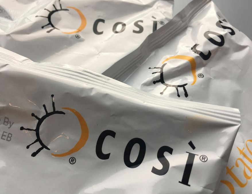 The Cosi logo on bags of potato chips are photographed on Wednesday, Sept. 28, 2016 in New York. The restaurant chain, known for its flatbread sandwiches, said it filed for Chapter 11 bankruptcy protection Wednesday and is seeking to sell itself to its lenders. The company has closed 29 stores, but said the remaining 76 Cosi restaurants located around the country will remain open as it goes through the bankruptcy process.  (AP Photo/Donald King)