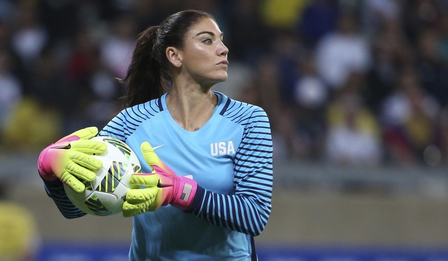 FILE - In this Aug. 3, 2016, file photo, United States&#39; goalkeeper Hope Solo takes the ball during a women&#39;s soccer game at the Rio Olympics against New Zealand in Belo Horizonte, Brazil. Th suspended U.S. national team goalkeeper said Wednesday, Sept. 28, 2016, she has had shoulder replacement surgery. (AP Photo/Eugenio Savio, File)