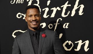 FILE - In this Sept. 21, 2016 file photo, Nate Parker, the director, screenwriter and star of &amp;quot;The Birth of a Nation,&amp;quot; poses at the premiere of the film in Los Angeles. In an interview with “60 Minutes,” Parker was unapologetic for a 17-year-old rape case that has surrounded his film. In excerpts from the interview to air Sunday, Parker said he was “falsely accused” and declined to make any apology.  (Photo by Chris Pizzello/Invision/AP, File)