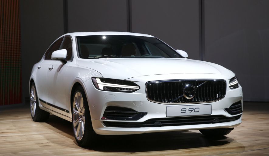 FILE - In this Monday, Jan. 11, 2016, file photo, the Volvo S90 debuts at the North American International Auto Show in Detroit. Volvo said Thursday, Sept. 29, 2016, that the automaker is recalling about 44,000 cars and SUVs in the U.S. because the air conditioning can leak water into the vehicles and cause air bags to malfunction. The recall covers 2016 and 2017 XC90 SUVs and S90 sedans. Volvo says in documents filed with safety regulators that a drain hose may have been installed incorrectly at the factory. (AP Photo/Paul Sancya, File)