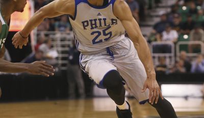 FILE - In this July 4, 2016, file photo, Philadelphia 76ers&#x27; Ben Simmons dribbles downcourt during an NBA Summer League basketball game against the San Antonio Spurs in Salt Lake City. No. 1 overall pick Simmons broke a bone in his right foot Friday, Sept. 30, 2016, during the 76ers&#x27; final training camp scrimmage at Stockton University. (AP Photo/Kim Raff, File)