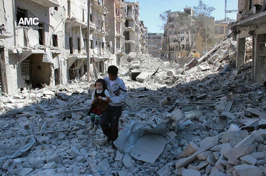 FILE -- In This April 21, 2014, file photo, provided by the anti-government activist group Aleppo Media Center (AMC), which has been authenticated based on its contents and other AP reporting, shows a Syrian man holding a girl as he stands on the rubble of houses that were destroyed by Syrian government forces air strikes in Aleppo, Syria. Nearly 100 children were killed in a single week in Aleppo as Syrian and Russian warplanes sought to bombard into submission the rebel eastern districts of the city that have held out against Syrian government forces for five years. Without hope for the future, no regular schooling and little access to nutritious food, the children of Aleppo and their parents struggle to survive and fear the threat an imminent ground offensive. (AP Photo/Aleppo Media Center AMC, File)