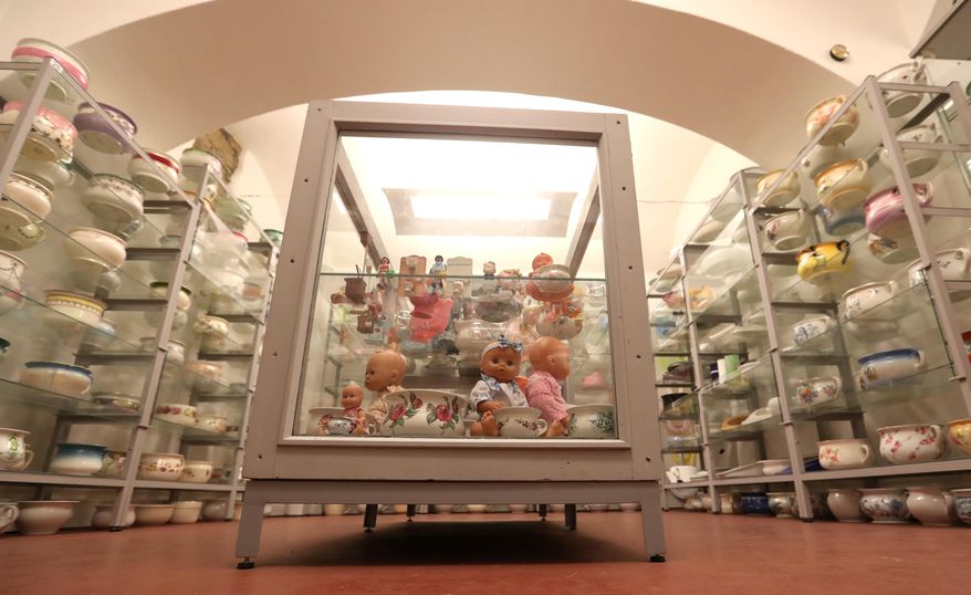 Chamber pots are on display at a Toilet Museum in Prague, Czech Republic, Friday, Sept. 30, 2016. Among the most interesting of some 2,000 pieces on display is a chamber pot which was acquired for the Lincoln Bedroom of the White House in 1892 and could serve up to 17 American presidents. Another chamber pot here was commissioned for Napoleon. (AP Photo/Petr David Josek)