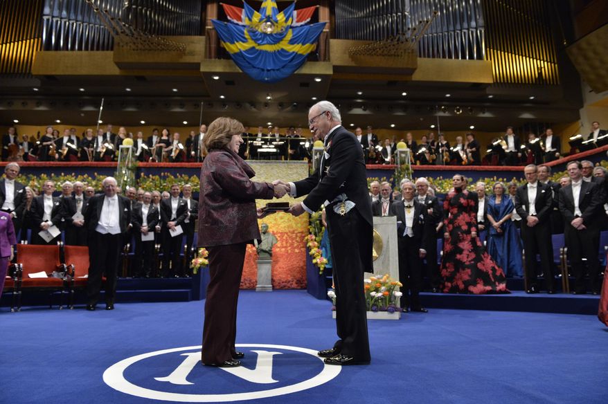 FILE - This is a Thursday, Dec. 10, 2015 file photo of the 2015 Nobel literature laureate Svetlana Alexievich of Belarus, left, receives the award from King Carl Gustaf of Sweden, during the 2015 Nobel prize award ceremony in Stockholm. The panel that awards the Nobel Prize in literature says this year's winner will be announced on Oct. 13, a week later than in previous years. Swedish Academy member Per Wastberg confirmed the date to The Associated Press on Friday Sept. 30, 2016. (Jonas Ekstromer/TT News Agency, File via AP)