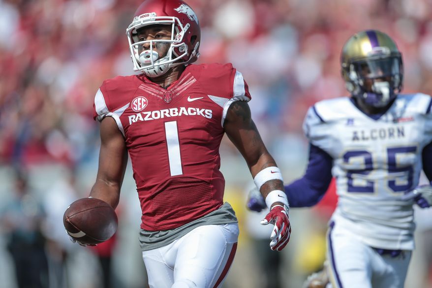 Arkansas wide receiver Jared Cornelius scores a touchdown during the first quarter of an NCAA football game against Alcorn State, Saturday, Oct. 1, 2016, in Little Rock, Ark. (AP Photo/ Chris Brashers)