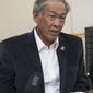 Singapore’s Dr. Ng Eng Hen, Minister for Defense, speaks at a press conference at Joint Base Pearl Harbor Hickam, Friday, Sept. 30, 2016 in Honolulu.  (AP Photo/Marco Garcia)