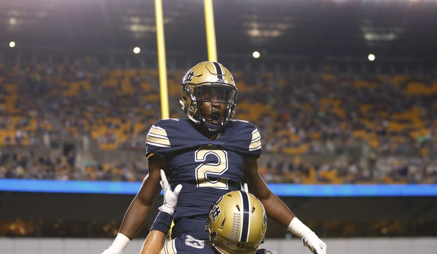 Pittsburgh wide receiver Maurice Ffrench (2) is held up by Pittsburgh tight end Scott Orndoff (83) after scoring a touchdown against Marshall during the first half of an NCAA college football game in Pittsburgh on Saturday, Oct. 1, 2016. (AP Photo/Jared Wickerham)