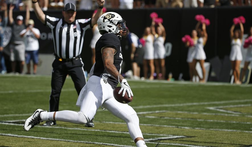 Colorado wide receiver Shay Fields (1) runs in a catch for a touchdown against Oregon State during the first half of an NCAA college football game in Boulder, Colo., Saturday, Oct. 1, 2016. (AP Photo/Brennan Linsley)