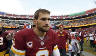 Washington Redskins quarterback Kirk Cousins (8) comes off the field after an NFL football game against the Cleveland Browns, Sunday, Oct. 2, 2016, in Landover, Md. The Redskins won 31-20. (AP Photo/Carolyn Kaster)